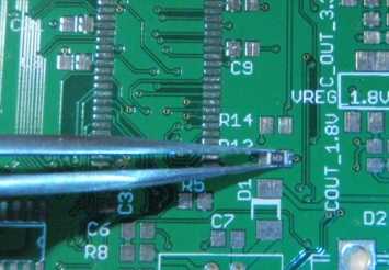 tweezers hold component
